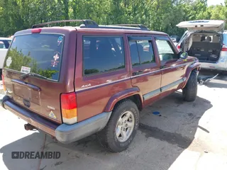 2001 Jeep Cherokee Sport with VIN 1J4FF48S51L516712, listed as a IAAI auction lot 42247399 with 323,576 mi miles and . Bid and sale history available at DreamBid. Image 4.