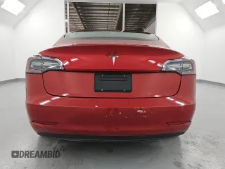 2022 Tesla Model 3 z VIN 5YJ3E1EA2NF291325, wystawiony jako Copart lot #60172435 z przebiegiem 128 928 mil mil oraz Czysty tytuł • Clean title. Historia ofert i sprzedaży dostępna na DreamBid. Obrazek 6.