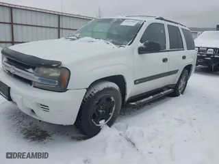 2004 Chevrolet TrailBlazer LT with VIN 1GNDT13S242213397, listed as a IAAI auction lot 41497865 with 196,901 mi miles. Bid and sale history available at carsss.com. Image 2.