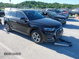 2021 Audi Q5 Premium z VIN WA1AAAFY9M2076387, wystawiony jako IAAI lot #42303925 z przebiegiem 46 954 mil mil oraz . Historia ofert i sprzedaży dostępna na DreamBid. Obrazek 1.