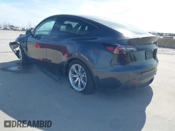 2024 Tesla Model Y with VIN 7SAYGDED9RF044789, listed as a IAAI auction lot 41817318 with Not Provided miles and . Bid and sale history available at DreamBid. Image 3.