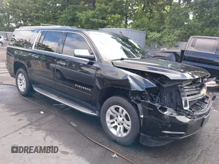 2015 Chevrolet Suburban LTZ z VIN 1GNSKKKC4FR602191, wystawiony jako IAAI lot #42683127 z przebiegiem 233 897 mil mil oraz . Historia ofert i sprzedaży dostępna na DreamBid. Obrazek 1.