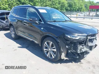 2020 Cadillac XT6 AWD Premium Luxury with VIN 1GYKPDRS2LZ147317, listed as a IAAI auction lot 42345966 with 98,949 mi miles and . Bid and sale history available at DreamBid. Image 1.