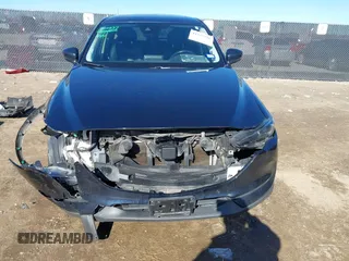 2019 Mazda CX-5 Grand Touring with VIN JM3KFBDM2K1685168, listed as a IAAI auction lot 41323598 with 88,429 mi miles. Bid and sale history available at carsss.com. Image 6.