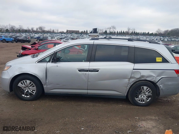 2014 Honda Odyssey LX with VIN 5FNRL5H22EB026657, listed as a IAAI auction lot 41114634 with 132,125 mi miles. Bid and sale history available at carsss.com. Image 14.