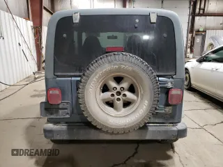 1999 Jeep Wrangler SE with VIN 1J4FY29P0XP412753, listed as a Copart auction lot 47015985 with 137,388 mi miles and Salvage Title. Bid and sale history available at carsss.com. Image 6.
