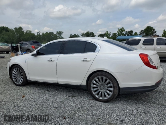 2013 Lincoln MKS with VIN 1LNHL9DK4DG612981, listed as a Copart auction lot 60701895 with 113,354 mi miles and Salvage title. Bid and sale history available at DreamBid. Image 2.