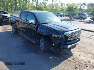 2017 GMC Canyon 4WD Denali z VIN 1GTG6EEN2H1307156, wystawiony jako IAAI lot #42314336 z przebiegiem 122 922 mil mil oraz . Historia ofert i sprzedaży dostępna na DreamBid. Obrazek 1.