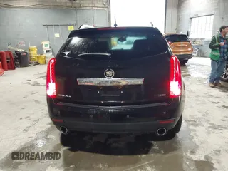 2012 Cadillac SRX Performance Collection z VIN 3GYFNEE37CS630391, wystawiony jako IAAI lot #42280516 z przebiegiem 137 330 mil mil oraz . Historia ofert i sprzedaży dostępna na DreamBid. Obrazek 16.