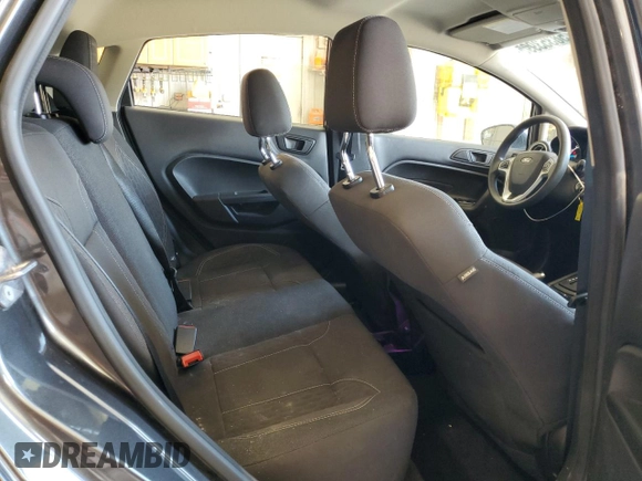 2019 Ford Fiesta SE z VIN 3FADP4EJ9KM159868, wystawiony jako Copart lot #58353995 z przebiegiem 87 940 mil mil oraz Szkoda całkowita • Salvage title. Historia ofert i sprzedaży dostępna na DreamBid. Obrazek 11.