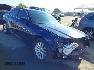 2013 Chrysler 300 with VIN 2C3CCAAG0DH561293, listed as a IAAI auction lot 42630526 with 193,718 mi miles and . Bid and sale history available at DreamBid. Image 1.