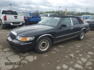 2002 Mercury Grand Marquis LS Premium z VIN 2MEFM75W42X636170, wystawiony jako Copart lot #54105025 z przebiegiem 119 721 mil mil oraz Czysty tytuł • Clean title. Historia ofert i sprzedaży dostępna na DreamBid. Obrazek 1.