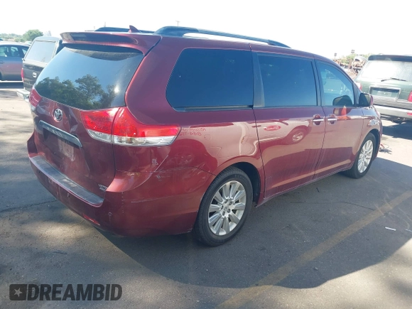 2011 Toyota Sienna XLE with VIN 5TDDK3DC8BS007764, listed as a IAAI auction lot 42689965 with 254,252 mi miles and . Bid and sale history available at DreamBid. Image 4.