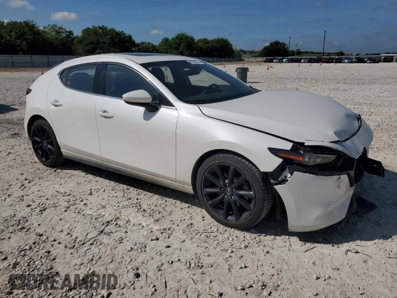 2019 Mazda Mazda3 Hatchback w/Premium Pkg with VIN JM1BPBNM7K1129443, listed as a Copart auction lot 65935074 with 44,567 mi miles and Salvage Title. Bid and sale history available at carsss.com. Image 4.