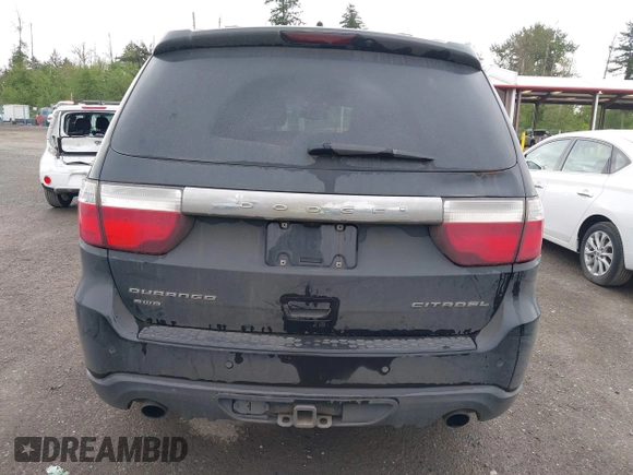 2012 Dodge Durango Citadel z VIN 1C4SDJET8CC116894, wystawiony jako IAAI lot #42211763 z przebiegiem 146 555 mil mil oraz . Historia ofert i sprzedaży dostępna na DreamBid. Obrazek 16.