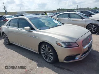 2017 Lincoln Continental Select z VIN 1LN6L9SK0H5631653, wystawiony jako IAAI lot #42092357 z przebiegiem Nie podano mil oraz . Historia ofert i sprzedaży dostępna na DreamBid. Obrazek 1.
