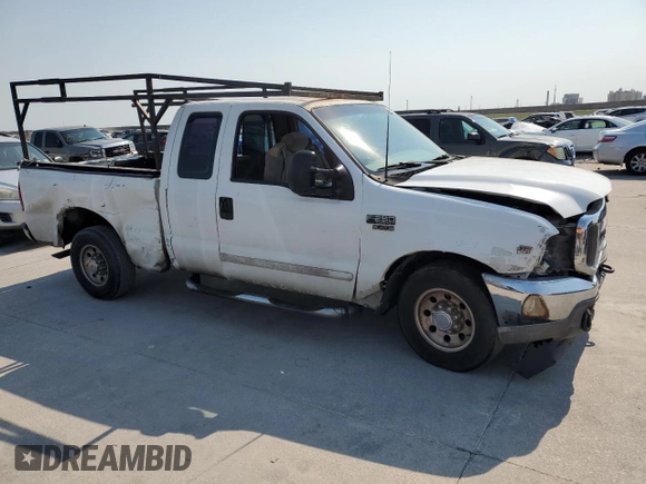 2001 Ford Super Duty F-250 XL with VIN 1FTNX20L01EC17379, listed as a Copart auction lot 74730024 with 309,556 mi miles and Salvage Title. Bid and sale history available at carsss.com. Image 4.