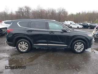 2019 Hyundai Santa Fe SE with VIN 5NMS23AD8KH008680, listed as a IAAI auction lot 42023218 with 67,745 mi miles and . Bid and sale history available at DreamBid. Image 13.