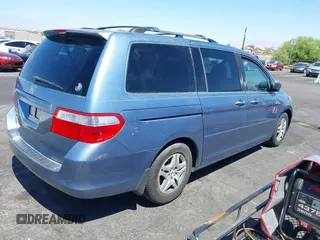2006 Honda Odyssey EX with VIN 5FNRL38466B065601, listed as a IAAI auction lot 42559342 with 258,995 mi miles and . Bid and sale history available at DreamBid. Image 4.