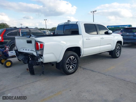 2023 Toyota Tacoma 4WD SR with VIN 3TMCZ5AN9PM566739, listed as a IAAI auction lot 41513763 with 16,708 mi miles. Bid and sale history available at carsss.com. Image 4.