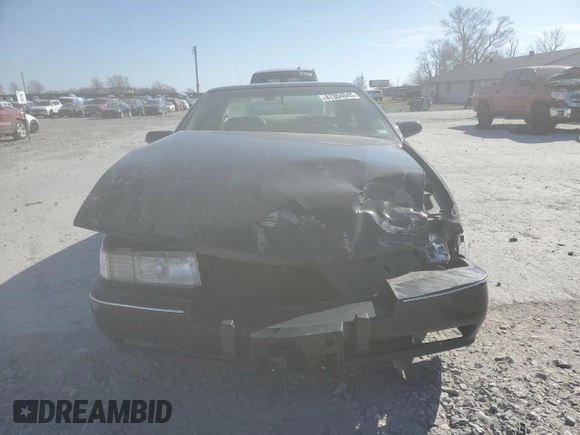 1996 Cadillac Seville Touring STS z VIN 1G6KY5299TU801228, wystawiony jako Copart lot #47304045 z przebiegiem Nie podano mil oraz Szkoda całkowita • Salvage title. Historia ofert i sprzedaży dostępna na DreamBid. Obrazek 5.