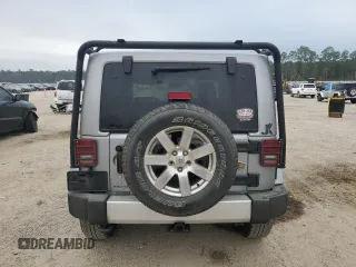 2015 Jeep Wrangler Sahara with VIN 1C4AJWBG8FL651169, listed as a Copart auction lot 44468995 with 119,419 mi miles and Salvage title. Bid and sale history available at DreamBid. Image 6.