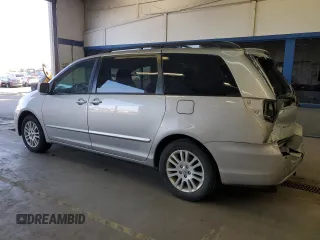 2010 Toyota Sienna XLE with VIN 5TDYK4CC0AS309461, listed as a Copart auction lot 51869275 with 156,598 mi miles and Salvage Title. Bid and sale history available at carsss.com. Image 2.
