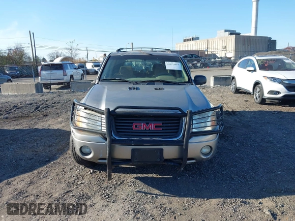 2002 GMC Envoy SLT with VIN 1GKDT13S822304832, listed as a IAAI auction lot 40874054 with 132,883 mi miles. Bid and sale history available at carsss.com. Image 12.