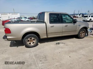 2001 Ford F-150 XLT z VIN 1FTRW07L01KB30498, wystawiony jako Copart lot #57157585 z przebiegiem 343 041 mil mil oraz Szkoda całkowita • Salvage title. Historia ofert i sprzedaży dostępna na DreamBid. Obrazek 3.