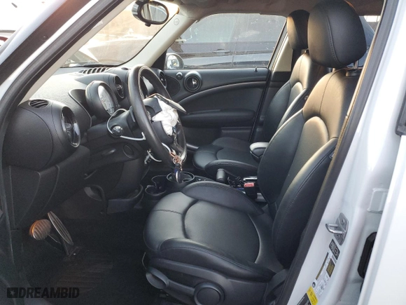 2014 MINI Cooper Countryman S with VIN WMWZC3C56EWP25014, listed as a Copart auction lot 88440985 with 95,058 mi miles and Salvage Title. Bid and sale history available at carsss.com. Image 7.