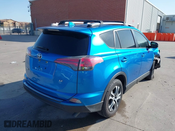 2017 Toyota RAV4 LE with VIN JTMZFREV4HJ115558, listed as a IAAI auction lot 41999381 with 94,223 mi miles and . Bid and sale history available at carsss.com. Image 4.