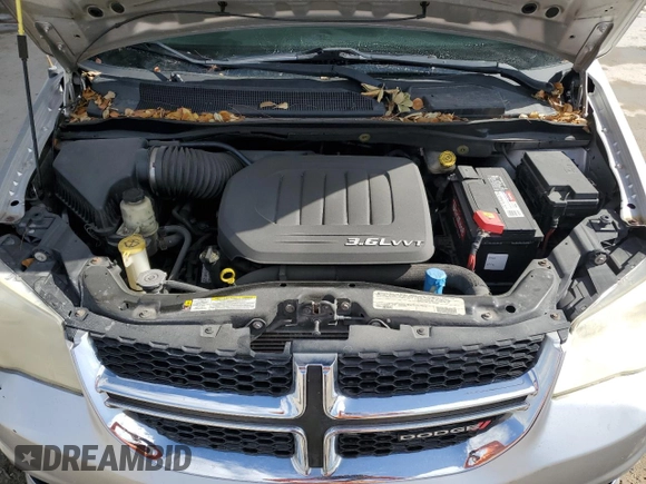 2012 Dodge Grand Caravan SXT with VIN 2C4RDGCG3CR373377, listed as a Copart auction lot 54604805 with 168,067 mi miles and Salvage Title. Bid and sale history available at DreamBid. Image 12.