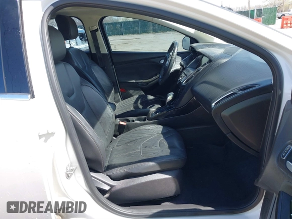 2015 Ford Focus Titanium с VIN 1FADP3J27FL341102, выставлен на аукционе IAAI как лот 41793450 с пробегом 96 465 миль миль и . История ставок и продаж доступна на DreamBid. Изображение 5.