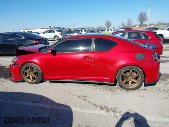 2016 Scion tC with VIN JTKJF5C77GJ026150, listed as a IAAI auction lot 41424088 with 96,370 mi miles. Bid and sale history available at carsss.com. Image 14.