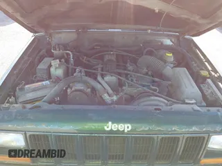 1999 Jeep Cherokee Sport with VIN 1J4FF68SXXL677013, listed as a IAAI auction lot 41993355 with 228,722 mi miles. Bid and sale history available at carsss.com. Image 10.