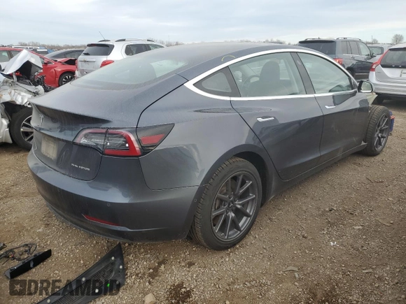 2018 Tesla Model 3 Long Range Battery z VIN 5YJ3E1EB3JF103804, wystawiony jako Copart lot #83752134 z przebiegiem 128 507 mil mil oraz Szkoda całkowita • Salvage title. Historia ofert i sprzedaży dostępna na DreamBid. Obrazek 3.