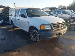 2004 Ford F-150 Heritage XL with VIN 2FTRX17204CA84111, listed as a IAAI auction lot 41356393 with 201,755 mi miles. Bid and sale history available at carsss.com. Image 1.