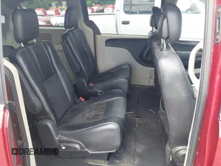 2014 Dodge Grand Caravan SXT with VIN 2C4RDGCG4ER366537, listed as a IAAI auction lot 42148032 with 126,531 mi miles and . Bid and sale history available at DreamBid. Image 8.
