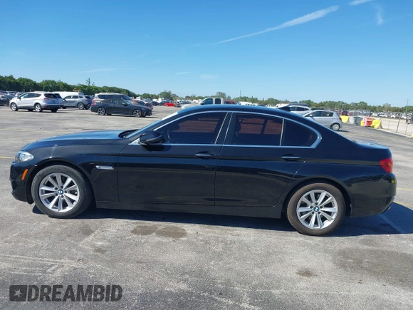 2015 BMW 5 Series 528i xDrive with VIN WBA5A7C58FG144069, listed as a IAAI auction lot 41854112 with 136,403 mi miles and . Bid and sale history available at DreamBid. Image 14.