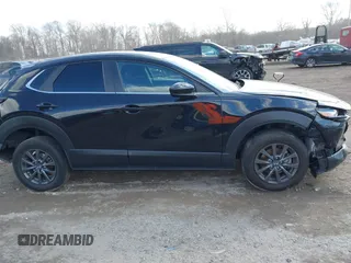 2022 Mazda CX-30 S with VIN 3MVDMBALXNM402265, listed as a IAAI auction lot 41458605 with 76,291 mi miles and . Bid and sale history available at carsss.com. Image 13.