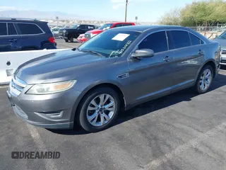2011 Ford Taurus SEL with VIN 1FAHP2EW9BG158991, listed as a IAAI auction lot 41530132 with 153,323 mi miles. Bid and sale history available at carsss.com. Image 2.