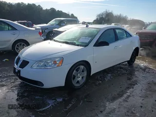 2009 Pontiac G6 1SA z VIN 1G2ZG57B394187803, wystawiony jako IAAI lot #41100404 z przebiegiem 242 388 mil mil oraz . Historia ofert i sprzedaży dostępna na DreamBid. Obrazek 2.