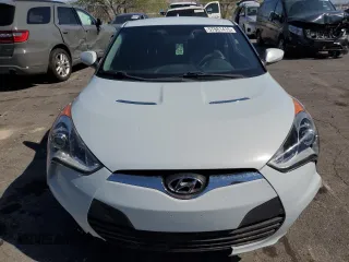 2015 Hyundai Veloster z VIN KMHTC6ADXFU222793, wystawiony jako Copart lot #57861415 z przebiegiem 98 318 mil mil oraz Szkoda całkowita • Salvage title. Historia ofert i sprzedaży dostępna na DreamBid. Obrazek 5.