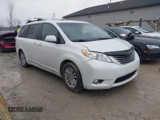 2015 Toyota Sienna XLE with VIN 5TDYK3DC1FS601703, listed as a IAAI auction lot 41656803 with 249,057 mi miles. Bid and sale history available at carsss.com. Image 1.