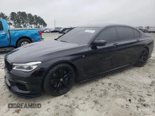 2018 BMW 7 Series 750i with VIN WBA7F0C51JGM22515, listed as a Copart auction lot 86486914 with 0 mi miles and Salvage Title. Bid and sale history available at carsss.com. Image 1.