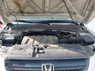 2005 Honda Pilot EX-L with VIN 5FNYF185X5B012415, listed as a IAAI auction lot 42395828 with 246,342 mi miles and . Bid and sale history available at DreamBid. Image 10.