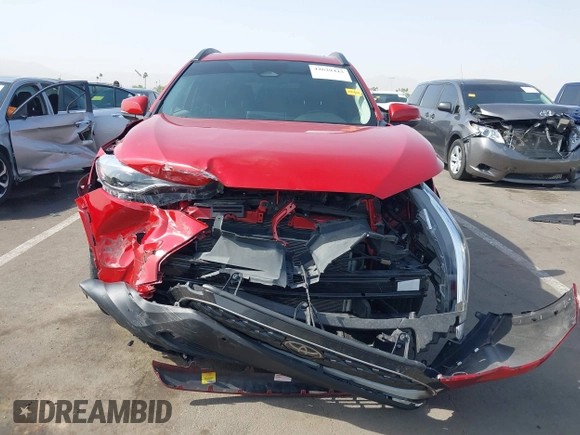 2023 Toyota Corolla Cross XLE z VIN 7MUDAAAG0PV065993, wystawiony jako IAAI lot #42629443 z przebiegiem 16 056 mil mil oraz . Historia ofert i sprzedaży dostępna na DreamBid. Obrazek 6.