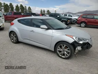 2016 Hyundai Veloster z VIN KMHTC6AD6GU298223, wystawiony jako Copart lot #54957445 z przebiegiem 92 525 mil mil oraz Czysty tytuł • Clean title. Historia ofert i sprzedaży dostępna na DreamBid. Obrazek 4.