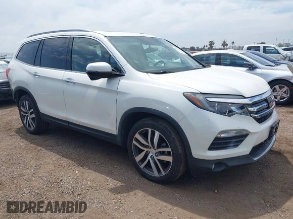2017 Honda Pilot Touring with VIN 5FNYF5H95HB042632, listed as a IAAI auction lot 42011885 with 103,321 mi miles. Bid and sale history available at carsss.com. Image 1.