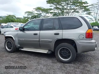 2005 GMC Envoy SLT z VIN 1GKDS13S152161472, wystawiony jako IAAI lot #40110978 z przebiegiem 141 908 mil mil oraz . Historia ofert i sprzedaży dostępna na DreamBid. Obrazek 15.